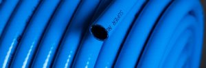 Roll of blue pneumatic hose